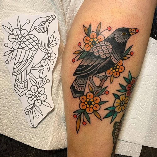 Mysterious blackbird tattoo for men, representing secrets and the unknown