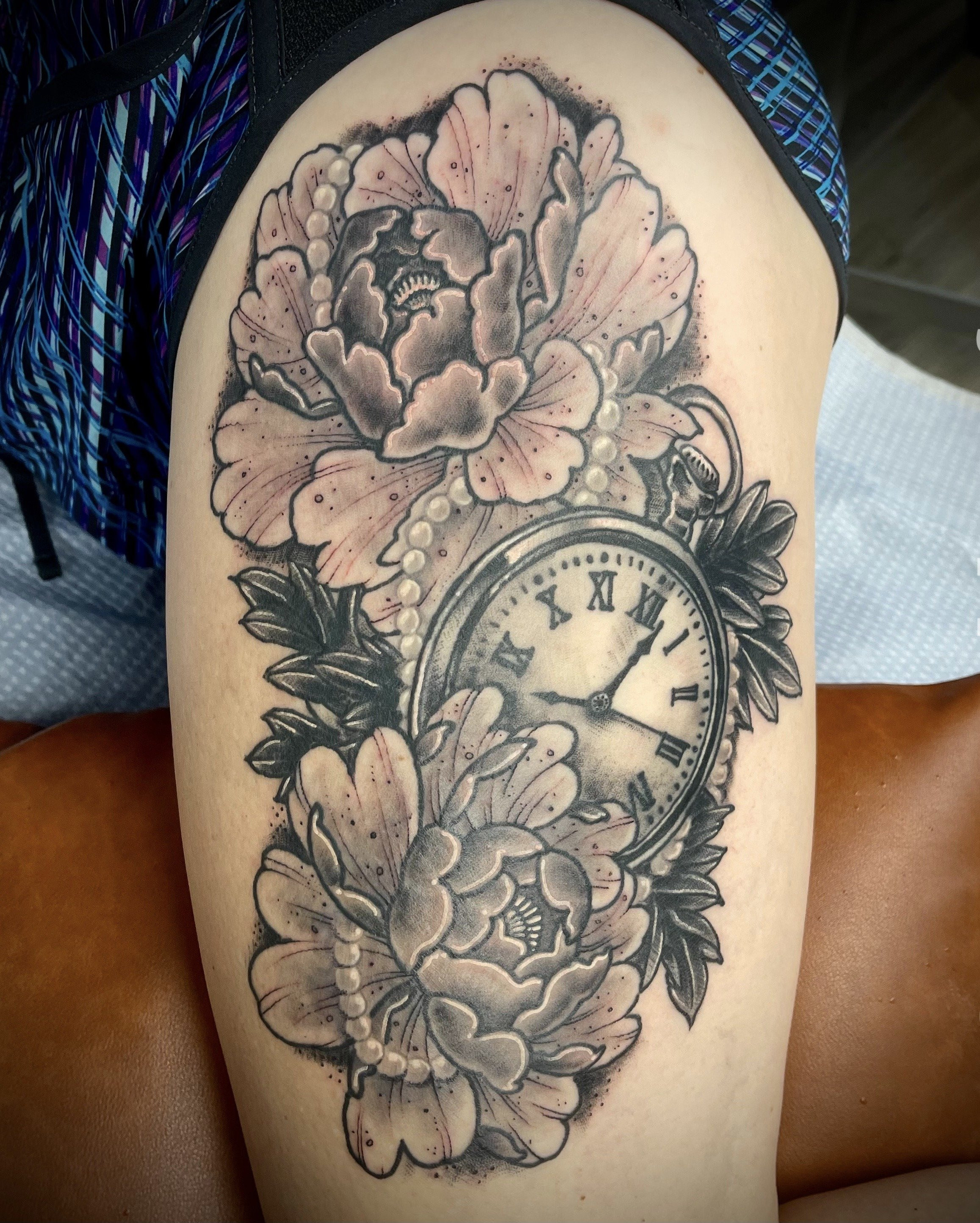 Black and grey clock and flowers tattoo for women