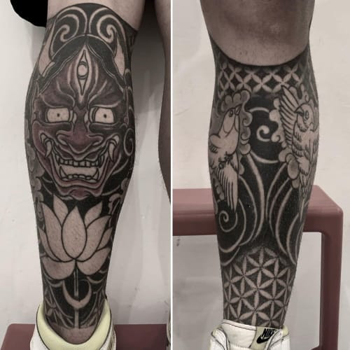 Blackwork leg tattoo design for men, utilizing the large leg canvas for extensive and impressive artwork.