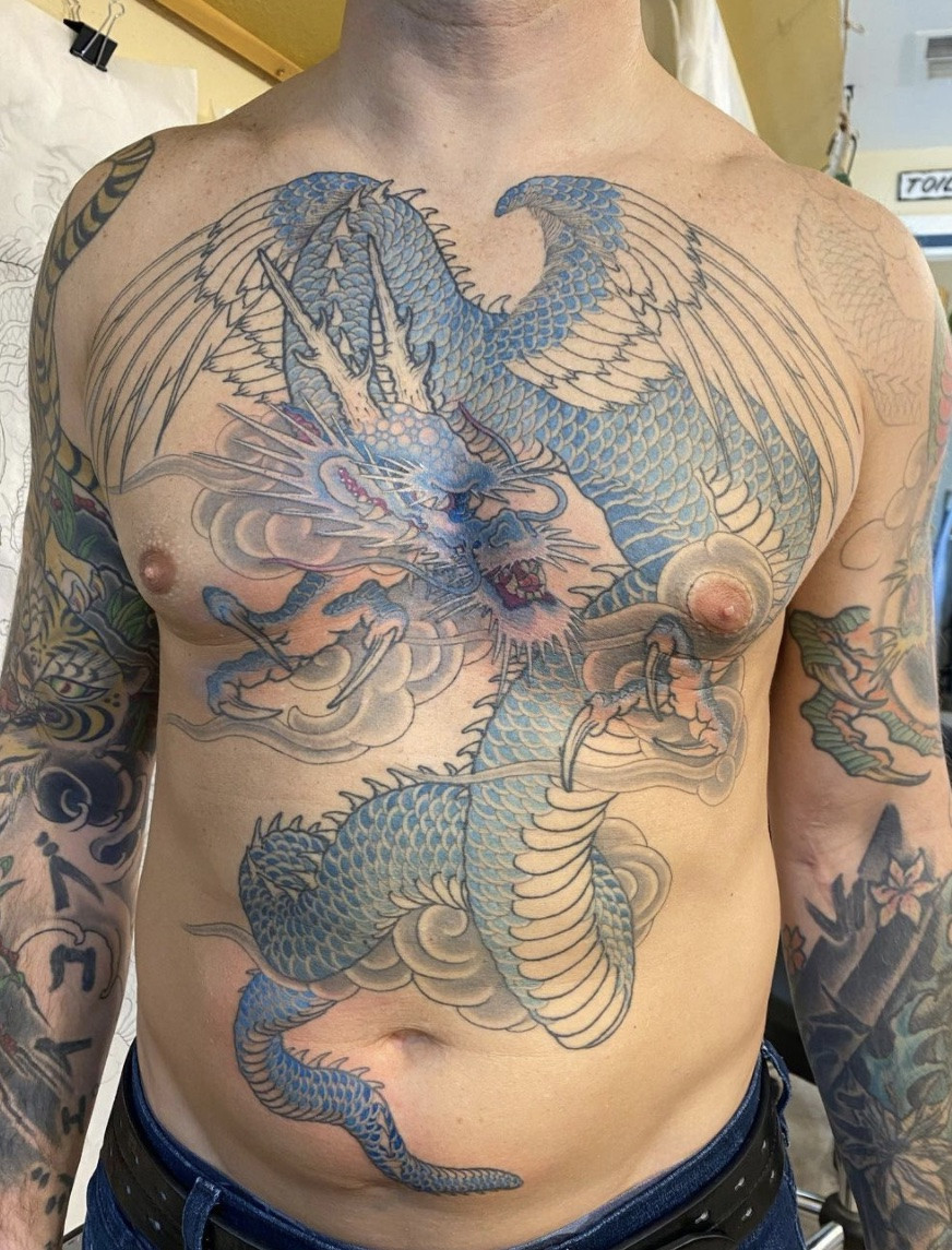 Serene blue colored dragon tattoo art