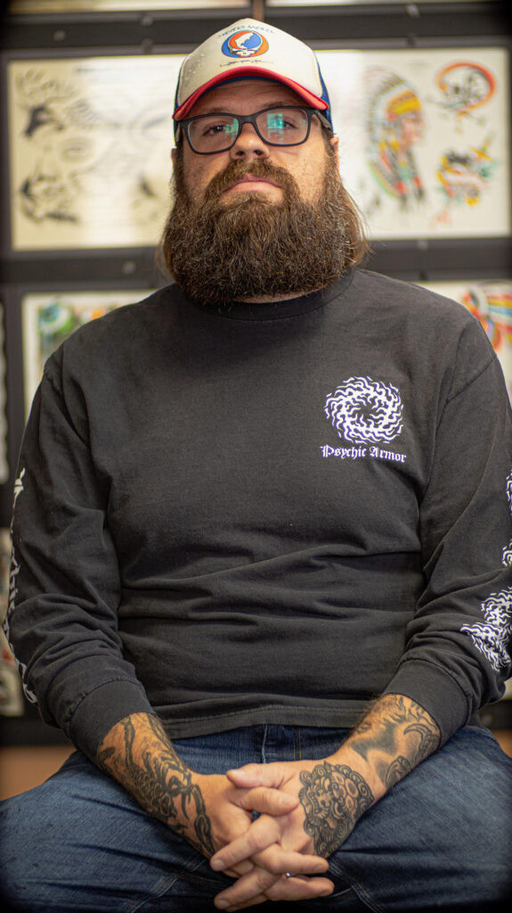 Brad Grubb, an American traditional tattoo artist at Saint Tattoo, Knoxville, TN, portrait.