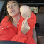 Brianna Chickenfry in car, explaining tattoo decision