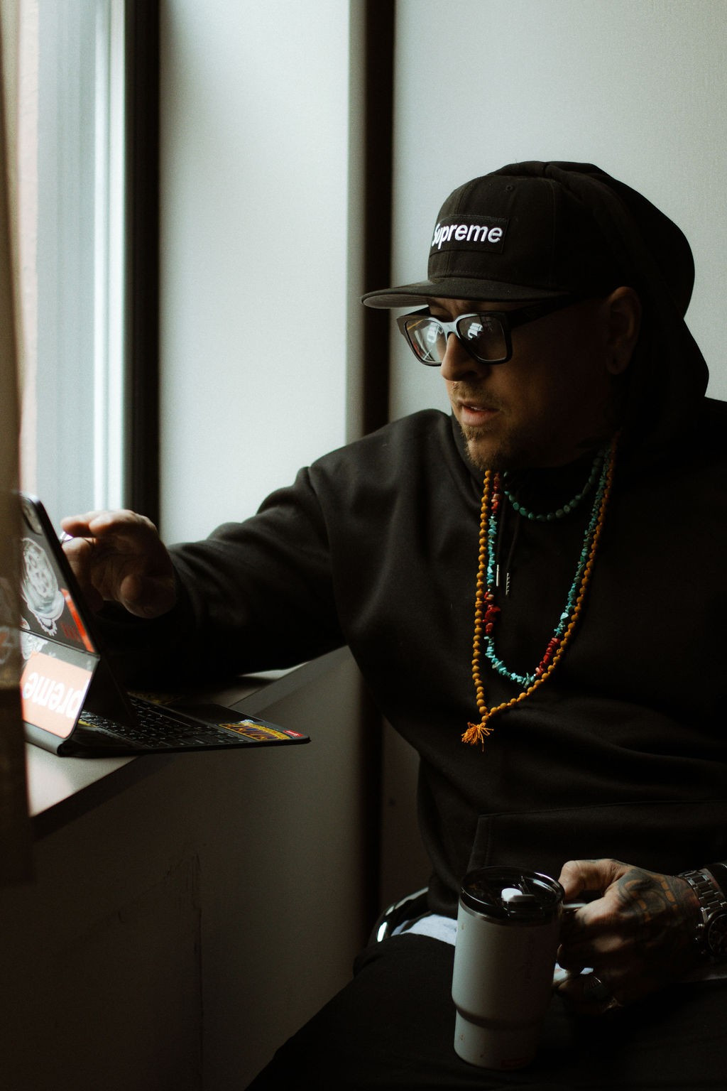 Dean Harden in his new studio, Resurrection Tattoo, reflecting his journey beyond Anchors End Tattoo.