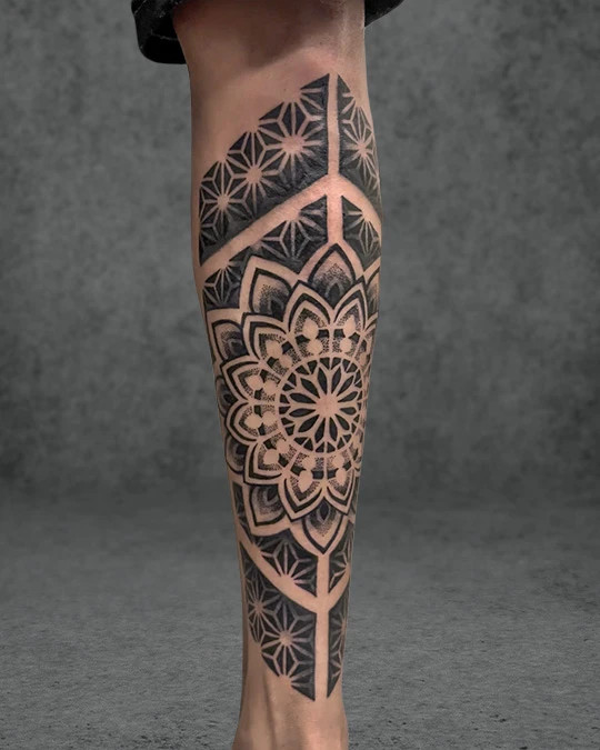 Intricate dotwork style Flower of Life tattoo, emphasizing detail and texture through meticulous stippling technique.