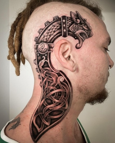 Two celtic tattoos on men, one on the chest with a stylized Celtic spiral design and another on the shoulder with a geometric Celtic knot pattern.