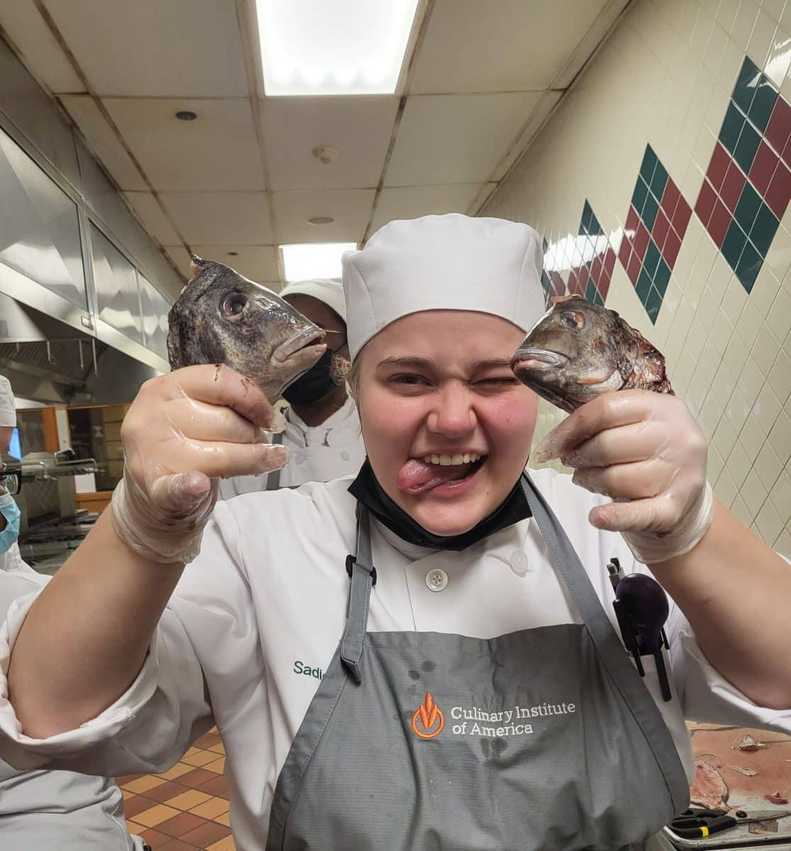 Chef Sadie preparing fish