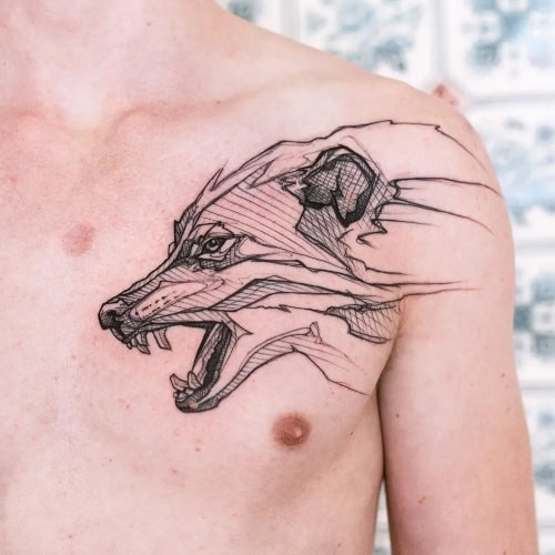 Minimalist chest tattoo with line art on a man's chest