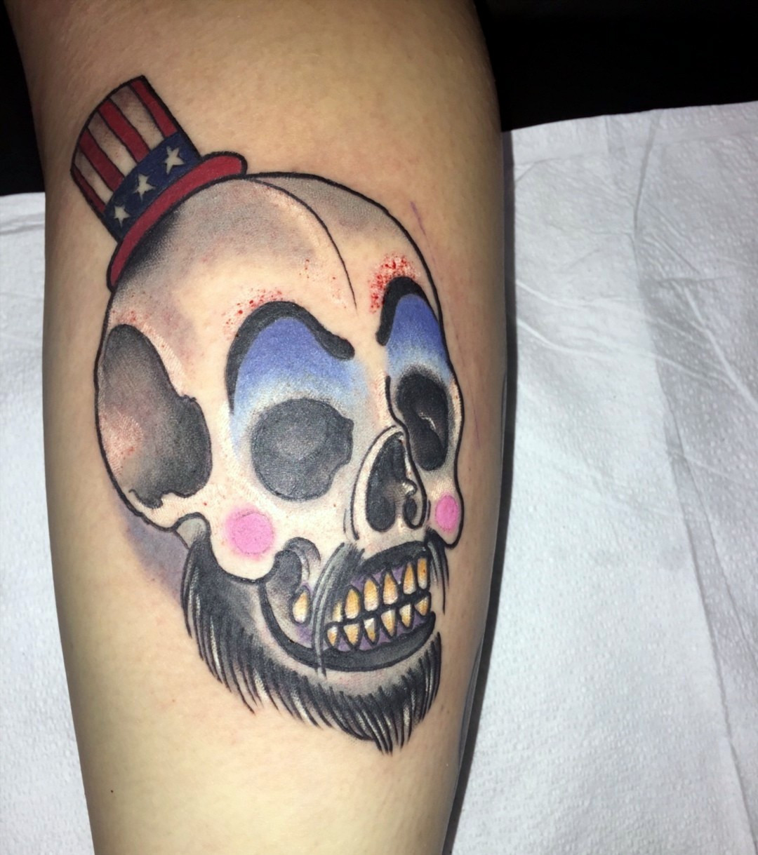 Baby Firefly pinup tattoo on a calf, next to a new Captain Spaulding skull tattoo from Chicago Tattoo Con