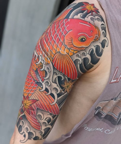 Two chinese tattoos on men, one on the chest with a stylized Chinese phoenix and another on the shoulder with a geometric Chinese pattern.