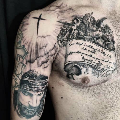 Praying hands tattoo with rosary beads on a man's chest