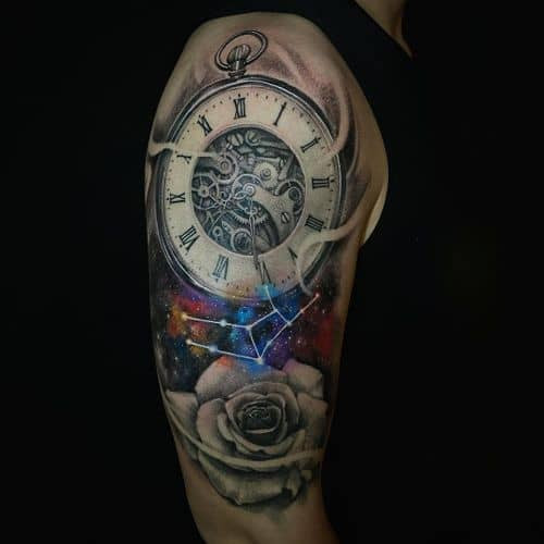 Two clock tattoos on men, one on the arm with a realistic grandfather clock and another on the forearm with a clock integrated into a geometric design.