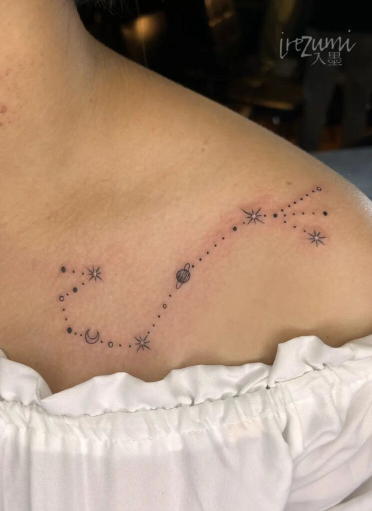 Detailed constellation with saturn, moon, and stars