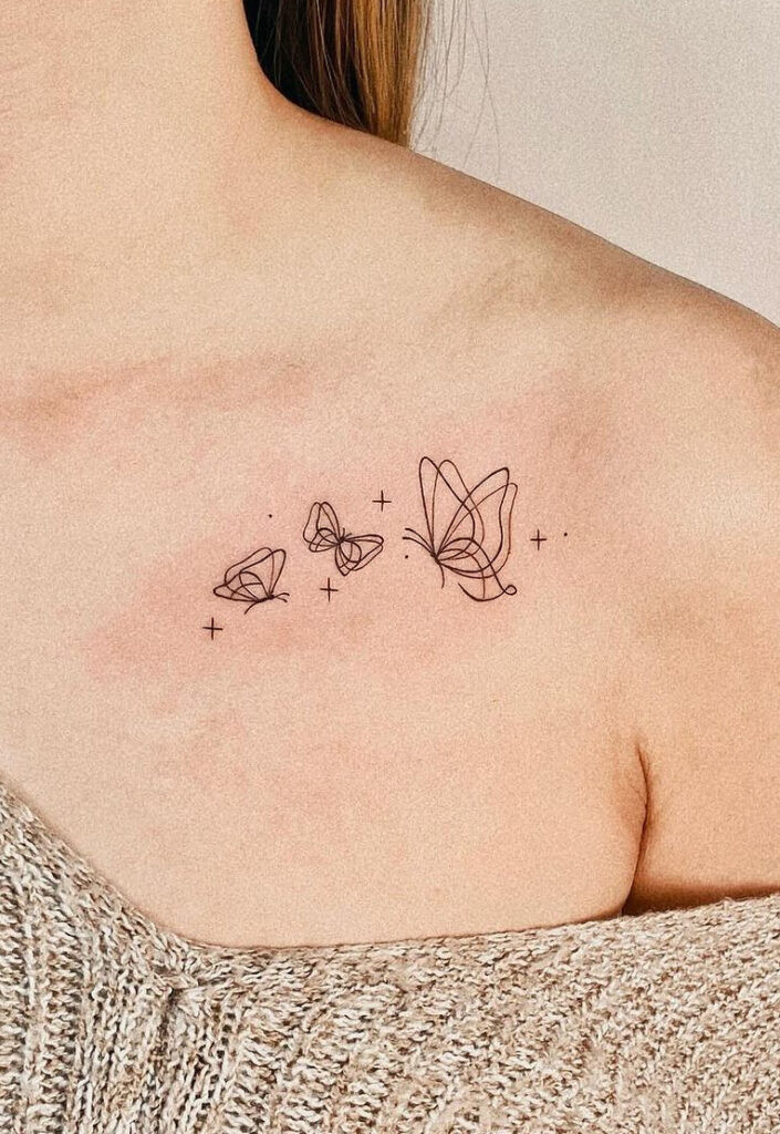 Blooming flowers collarbone tattoo