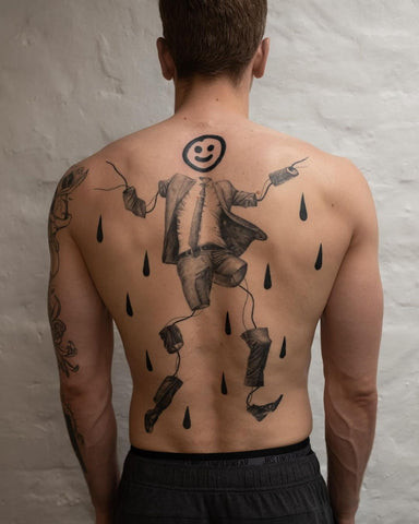 Trendy cool back tattoos for men featuring geometric patterns and mandala designs, showcasing stylish and trendy aesthetics.