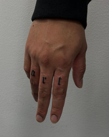 Intricate Cool Finger Tattoo for Men