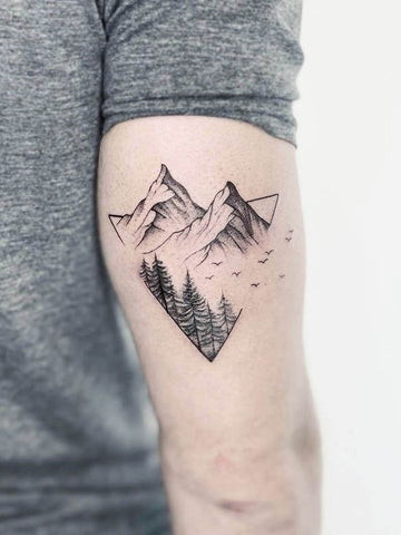 Mountain Symbol Tattoo: Minimalist Adventure Tattoo for Men