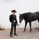 Christian Nodal, Mexican singer, poses for a Billboard cover shoot. This image predates rumors about his christian nodal tattoos removal.