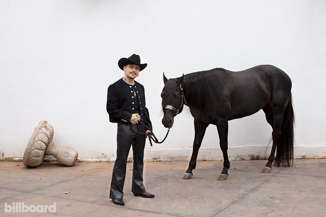 Christian Nodal, Mexican singer, poses for a Billboard cover shoot. This image predates rumors about his christian nodal tattoos removal.