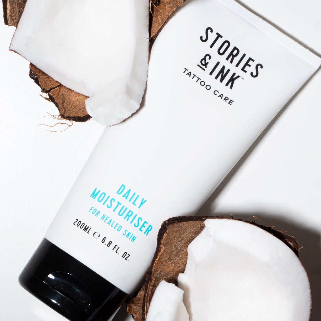 Daily moisturizer cream product shot, showcasing its smooth texture and label, emphasizing its role in maintaining tattoo vibrancy and skin hydration.