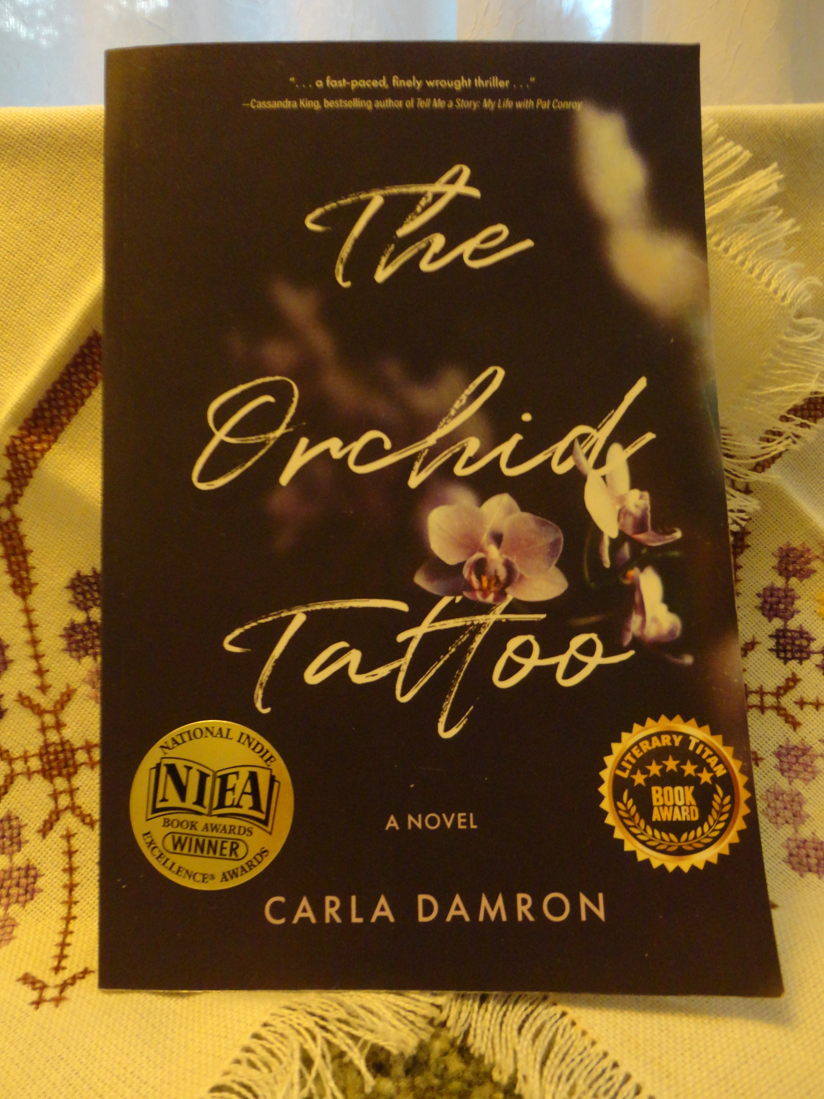 The Orchid Tattoo: Unveiling the Dark Beauty of Human Trafficking in Carla Damron’s Novel