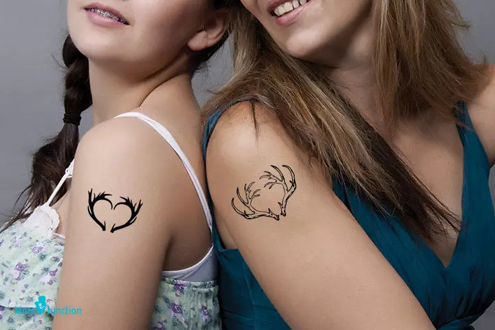 Deer antlers mother-daughter tattoo, symbolizing mutual protection