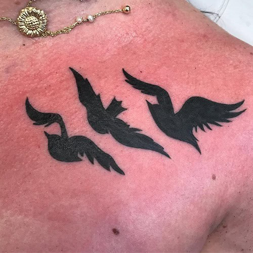 Inspiring divergent bird tattoo for men, symbolizing freedom and overcoming life's challenges