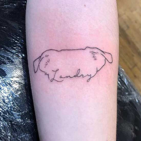 Dog ear handwriting tattoo with name