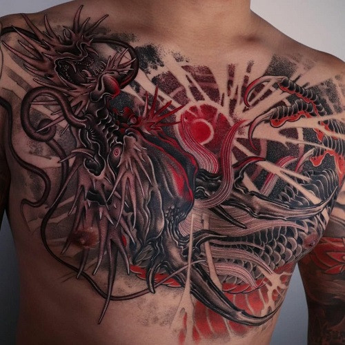 Large dragon tattoo across the chest