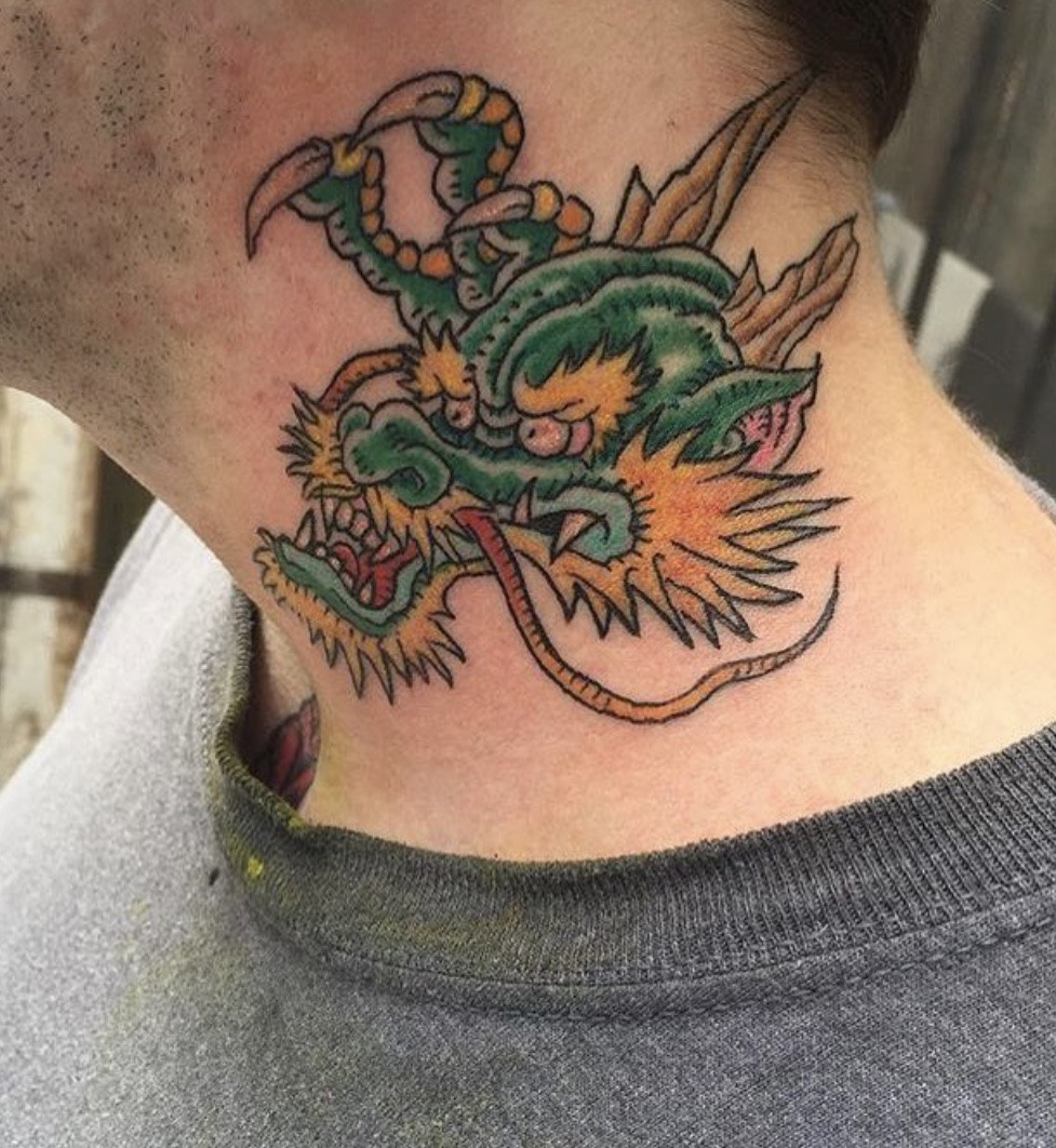 Dragon tattoo extending up the neck