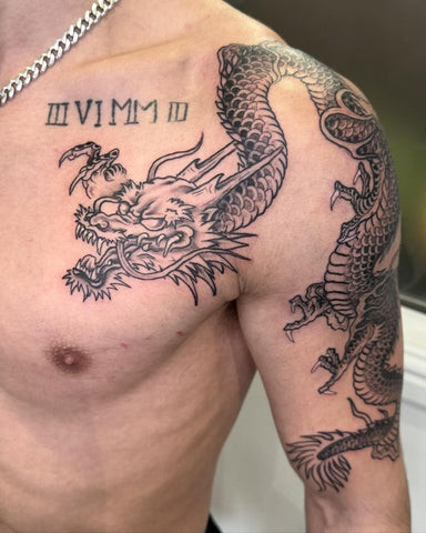 A dragon chest tattoo with vibrant colors and dynamic lines, symbolizing power, wisdom, and strength.