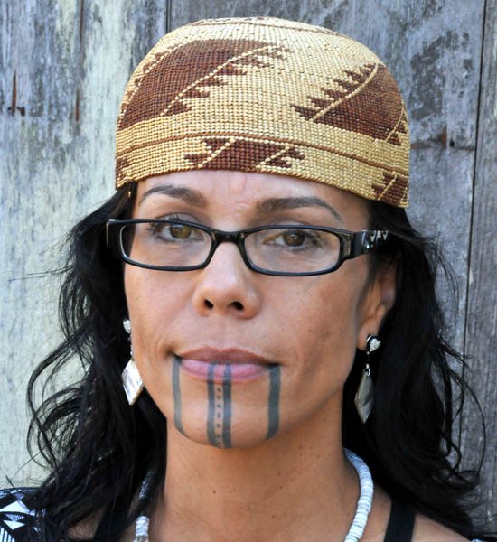 Sage LaPena, a Wintu herbalist and ethnobotanist, displays her traditional facial tattoo in Santa Rosa, California, highlighting its role in expressing cultural identity.
