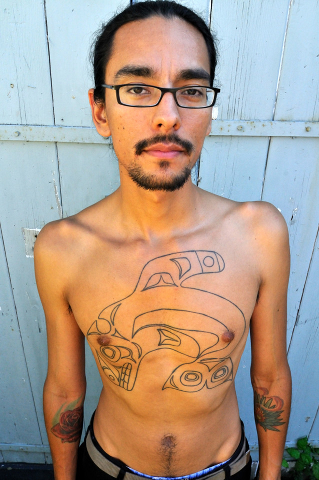 Tlingit tattoo artist Nahaan in 2012, showcasing the revitalization of traditional tattooing practices within Pacific Rim cultures.