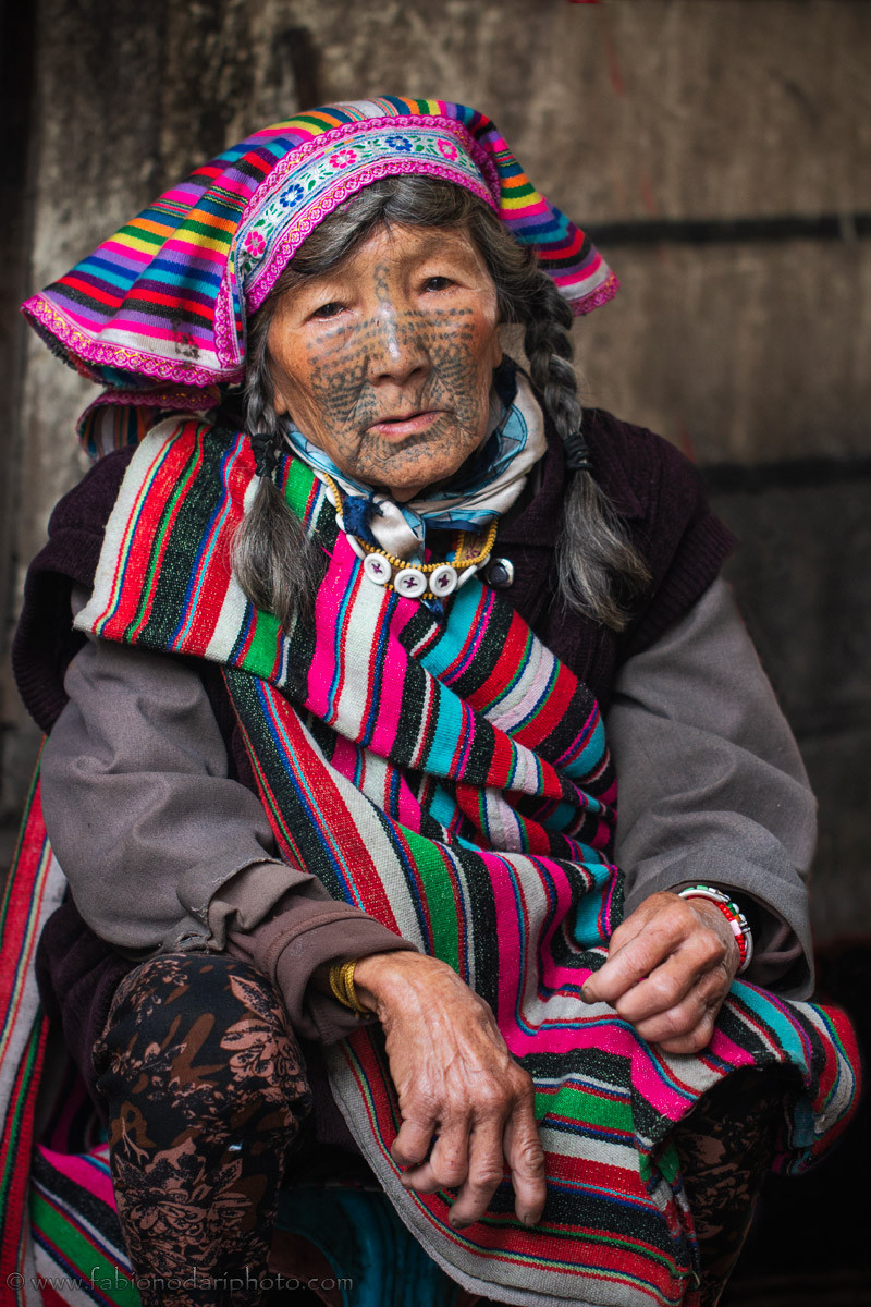 Dulong woman with tattoos on her face