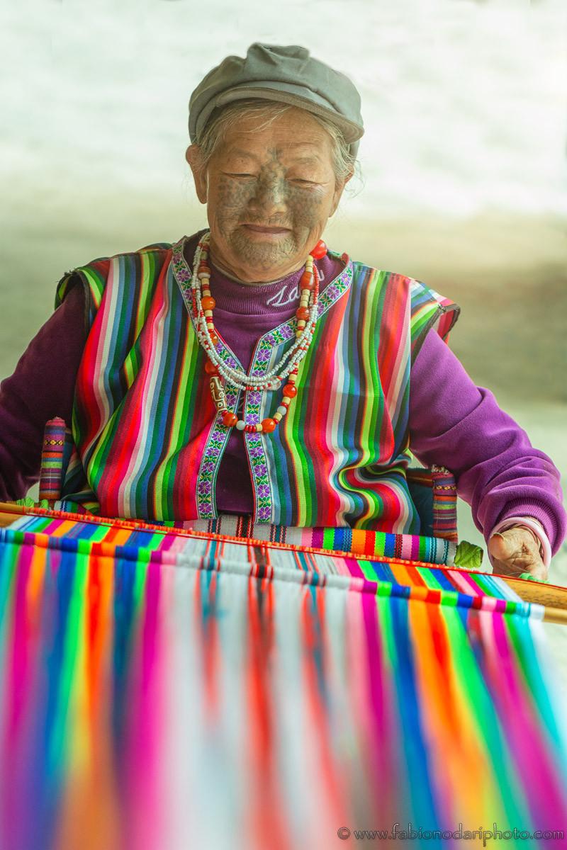 Dulong woman with tattoos on her face