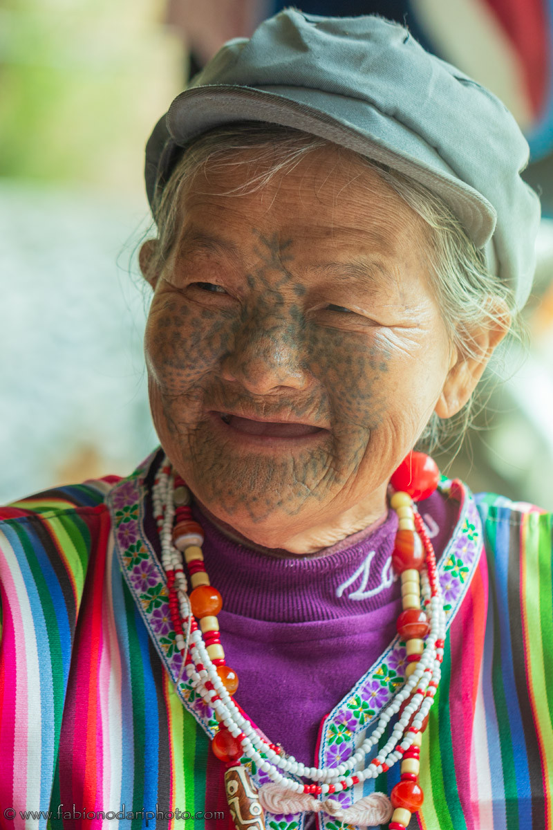 Dulong woman with tattoos on her face