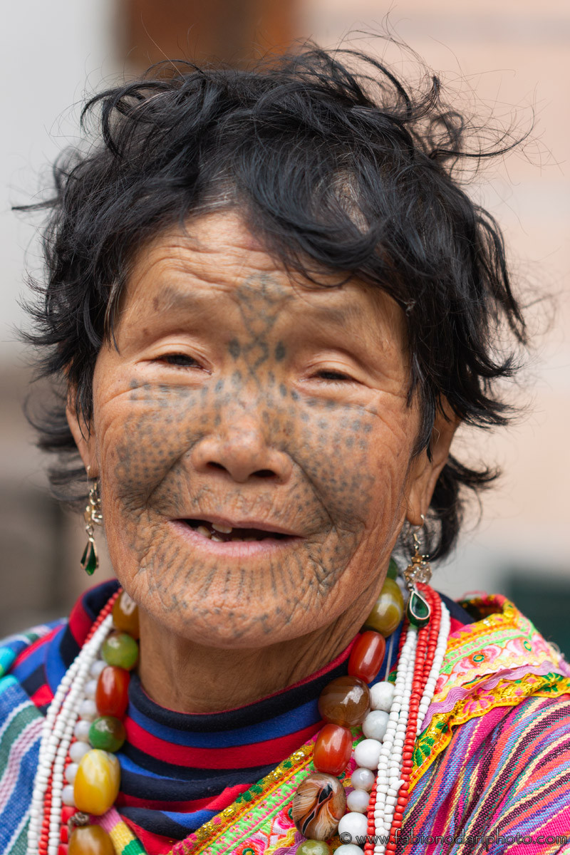 Dulong woman with tattoos on her face