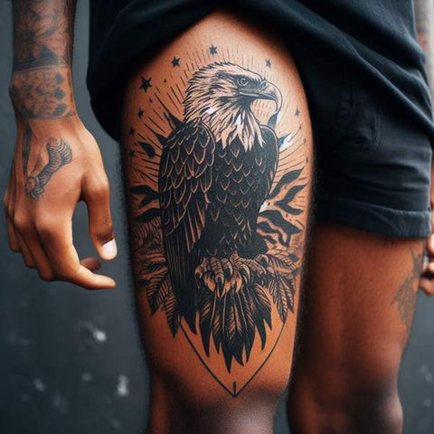 American traditional style eagle thigh tattoo for men.