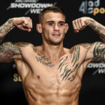 Dustin Poirier showcasing his extensive tattoo collection