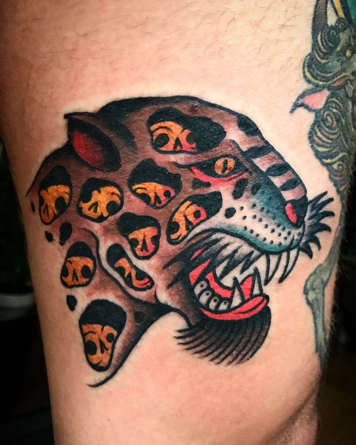 A tattoo by El Chanok featuring classic traditional elements combined with his personal artistic flair