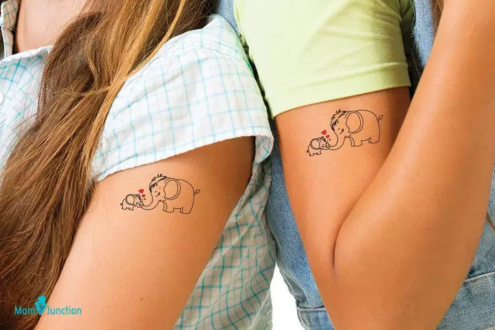 Cute mother and baby elephant tattoo, representing maternal protection