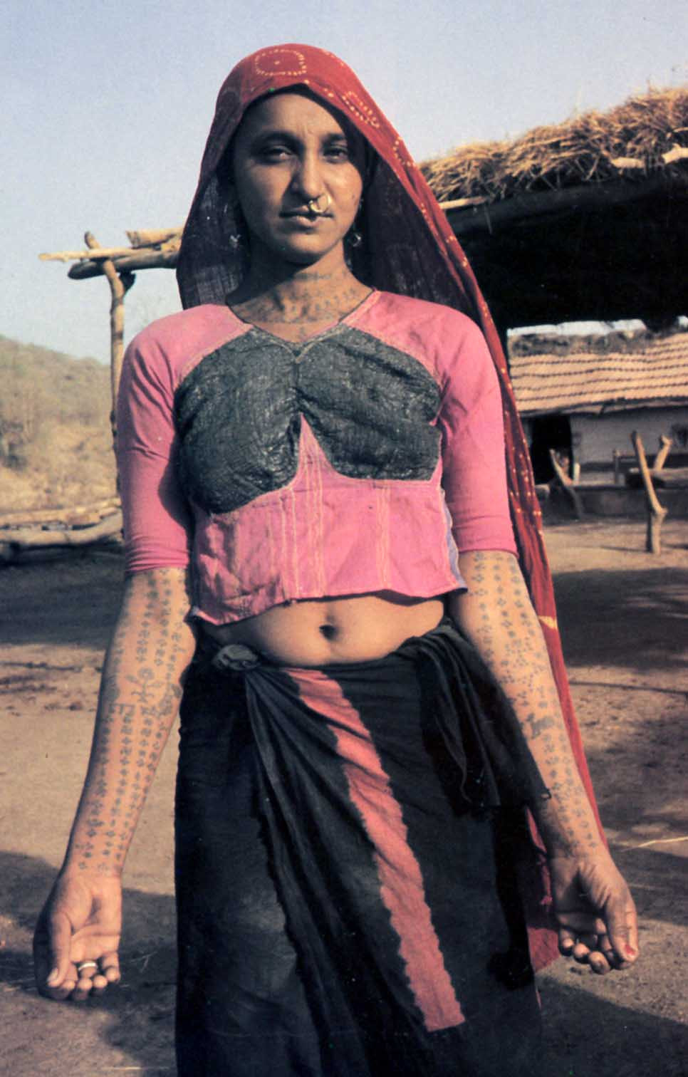 Tattooed Rabari woman, displaying facial and body tattoos