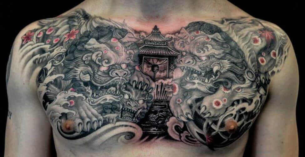 Paired Foo Dog Tattoo on Chest Featuring Male and Female Symbols