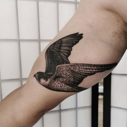 Bold free bird tattoo for men, representing courage, liberty, and breaking free from societal expectations