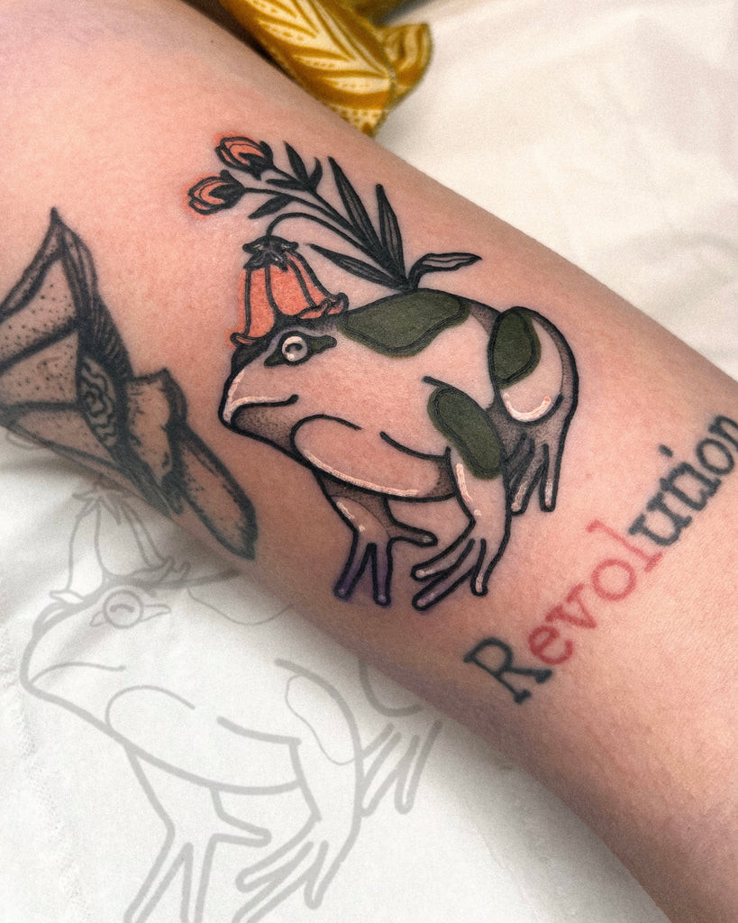 Frog tattoo created from flash by Lauren Hepple