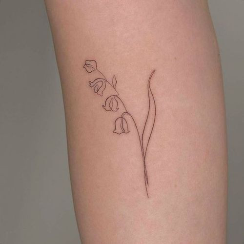 Lily of the valley stem tattoo in fine line