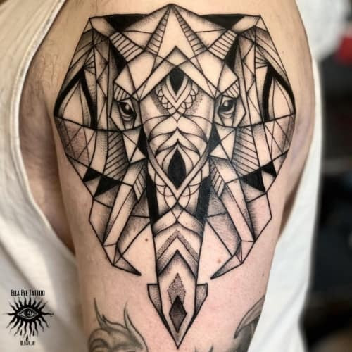 Geometric elephant tattoo depicting an elephant with geometric lines and shapes, symbolizing wisdom and strength.