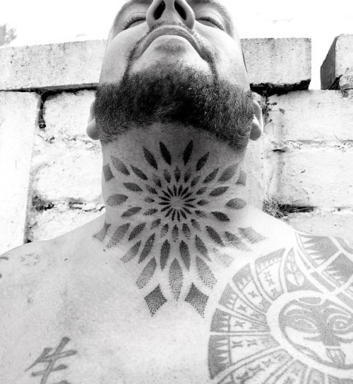 Geometric neck tattoo located on the neck, featuring geometric patterns that make a bold and visible statement.