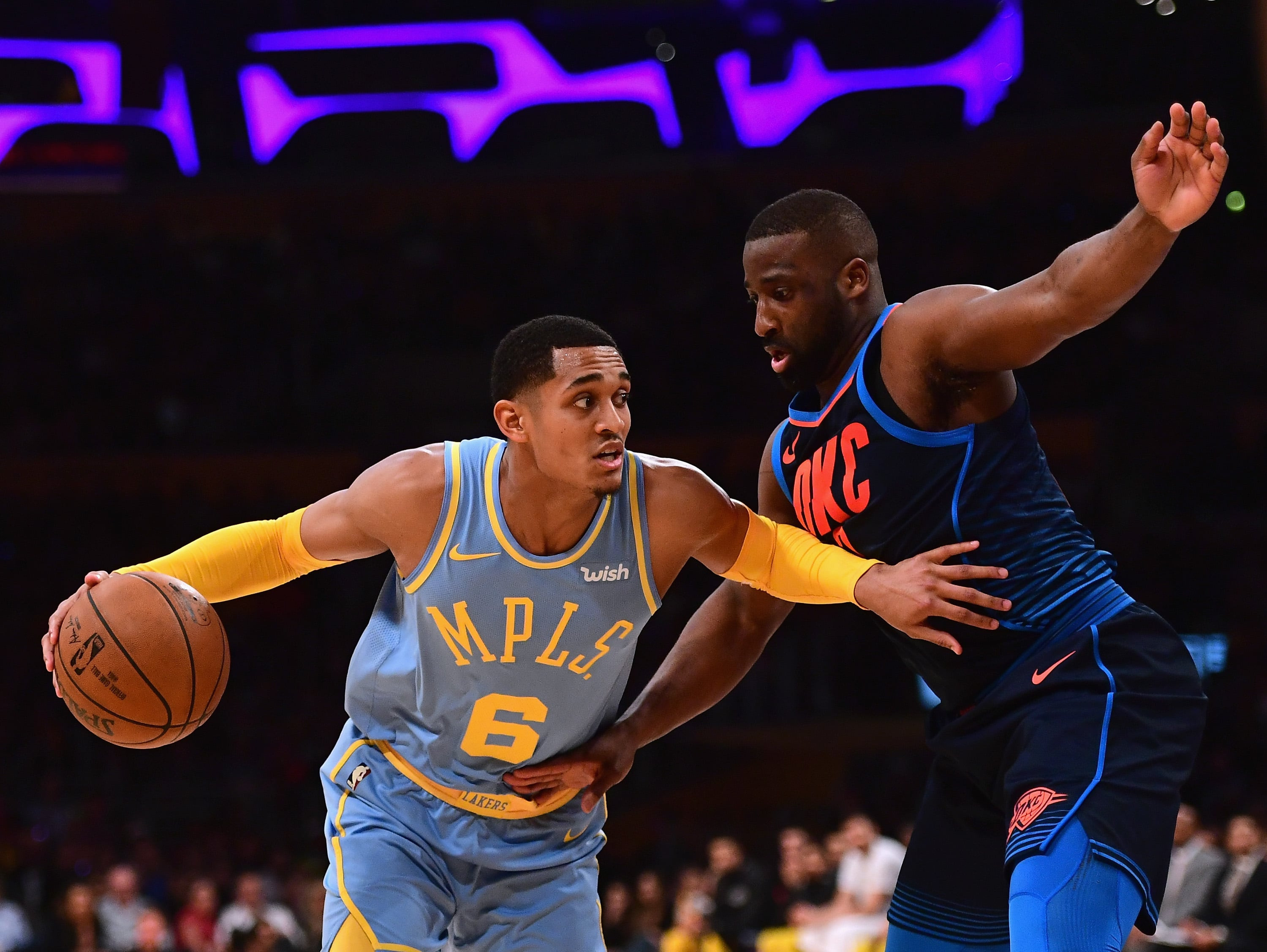 Jordan Clarkson's shoulder tattoo featuring his brother Bear in a Superman costume