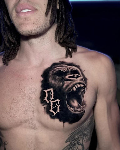 Gorilla chest tattoo, symbolizing strength, power, and protection with muscular detail.