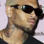 Chris Brown's neck tattoo resembling Rihanna